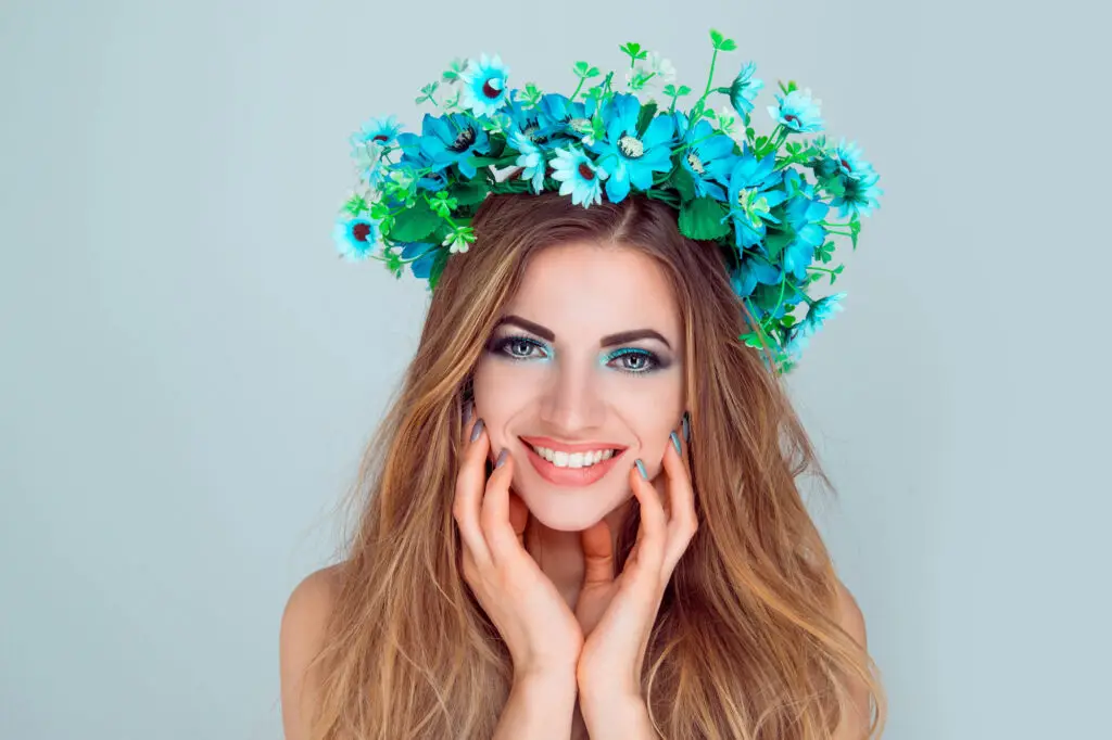 Woman wearing a floral crown symbolizing spring renewal and the equinox